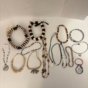 Lot of 17 Hawaiian inspired necklaces. Kukui Nut & Cowrie Shell Leis and more.